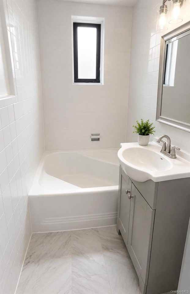 3730 83rd St #5L - Photo 6 of 8