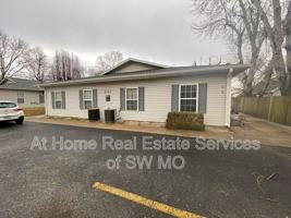 featured image of 211 E Robberson St #B