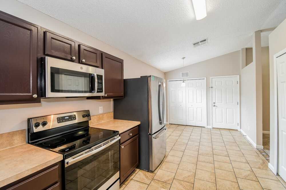8706 Star Leaf Rd N - Photo 7 of 16