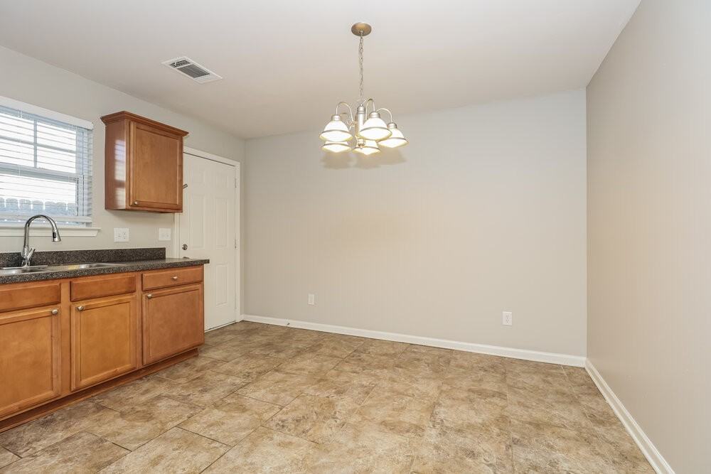 8051 Logan Dr - Photo 6 of 17