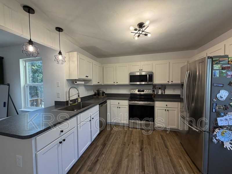 921 Tennyson St - Photo 5 of 17