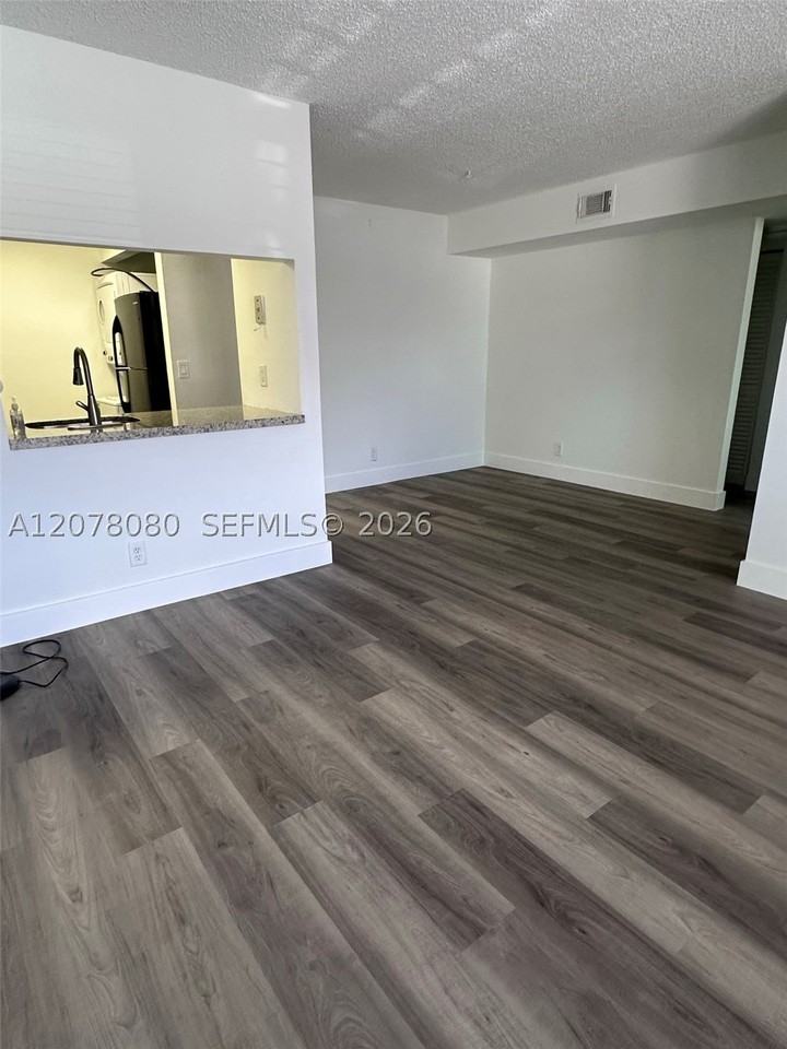 10049 Winding Lake Rd #103 - Photo 2 of 8