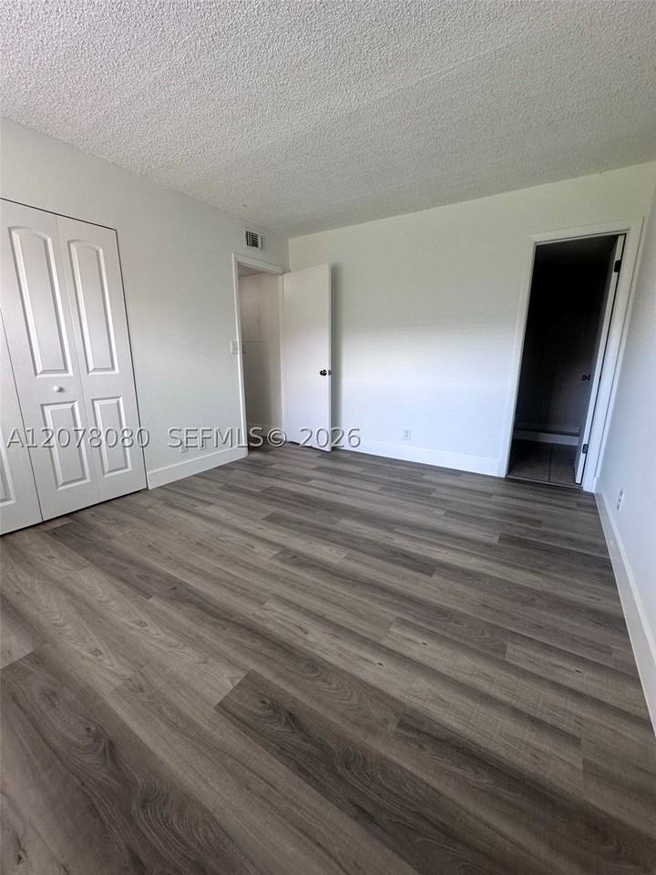 10049 Winding Lake Rd #103 - Photo 5 of 8
