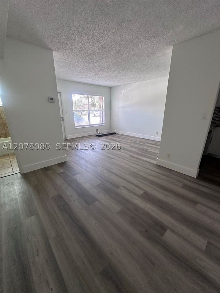 10049 Winding Lake Rd #103 - Photo 6 of 8