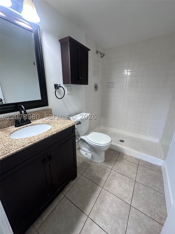 10049 Winding Lake Rd #103 - Photo 7 of 8
