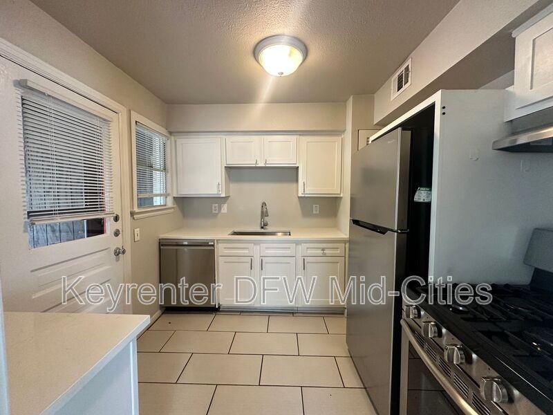 309 N Oak Cliff Blvd - Photo 5 of 15
