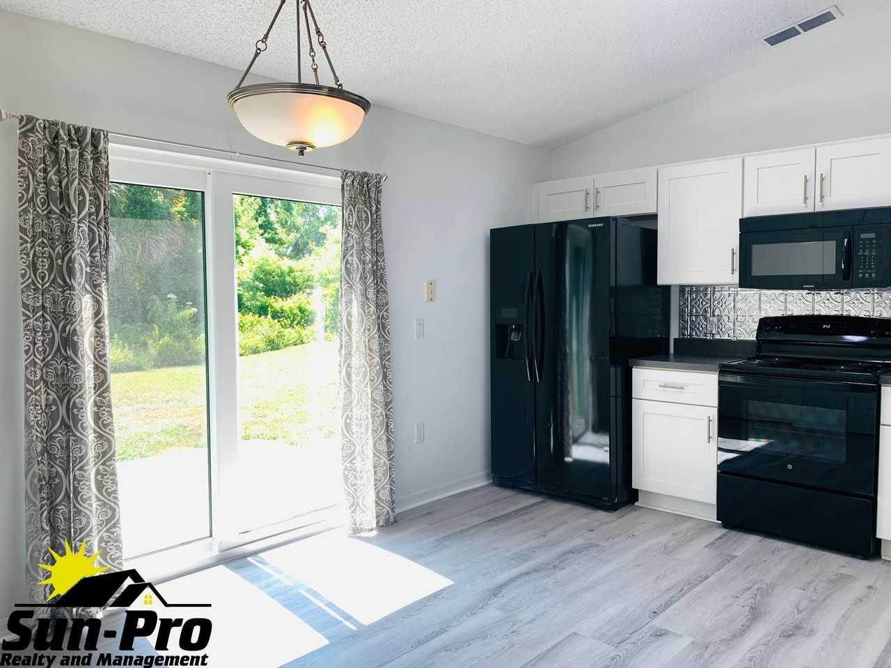 1868 Umbrella Tree Dr - Photo 4 of 18