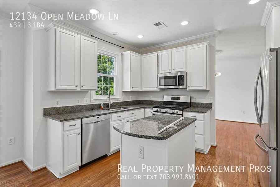 12134 Open Meadow Ln - Photo 7 of 35