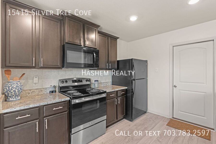 15415 Silver Tree Cv - Photo 2 of 14