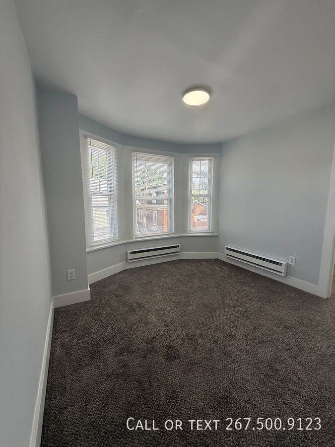 241 W Queen Ln - Photo 7 of 14