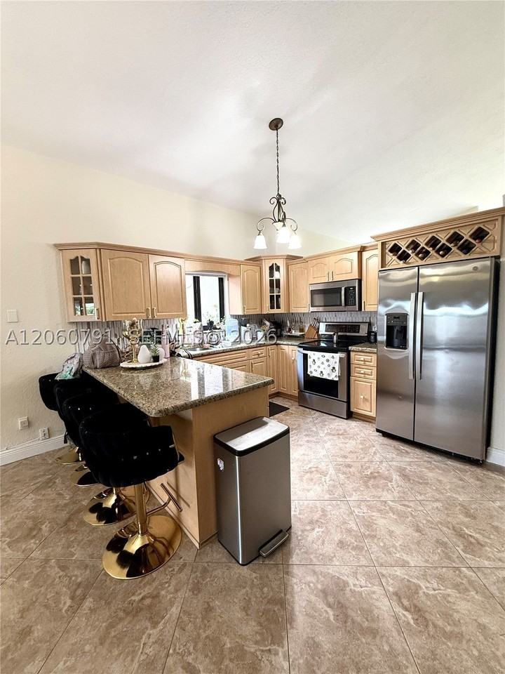 8731 Nw 153rd Ter - Photo 6 of 24