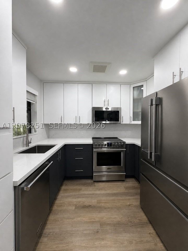 3295 Cocoplum Cir #3323 - Photo 3 of 18