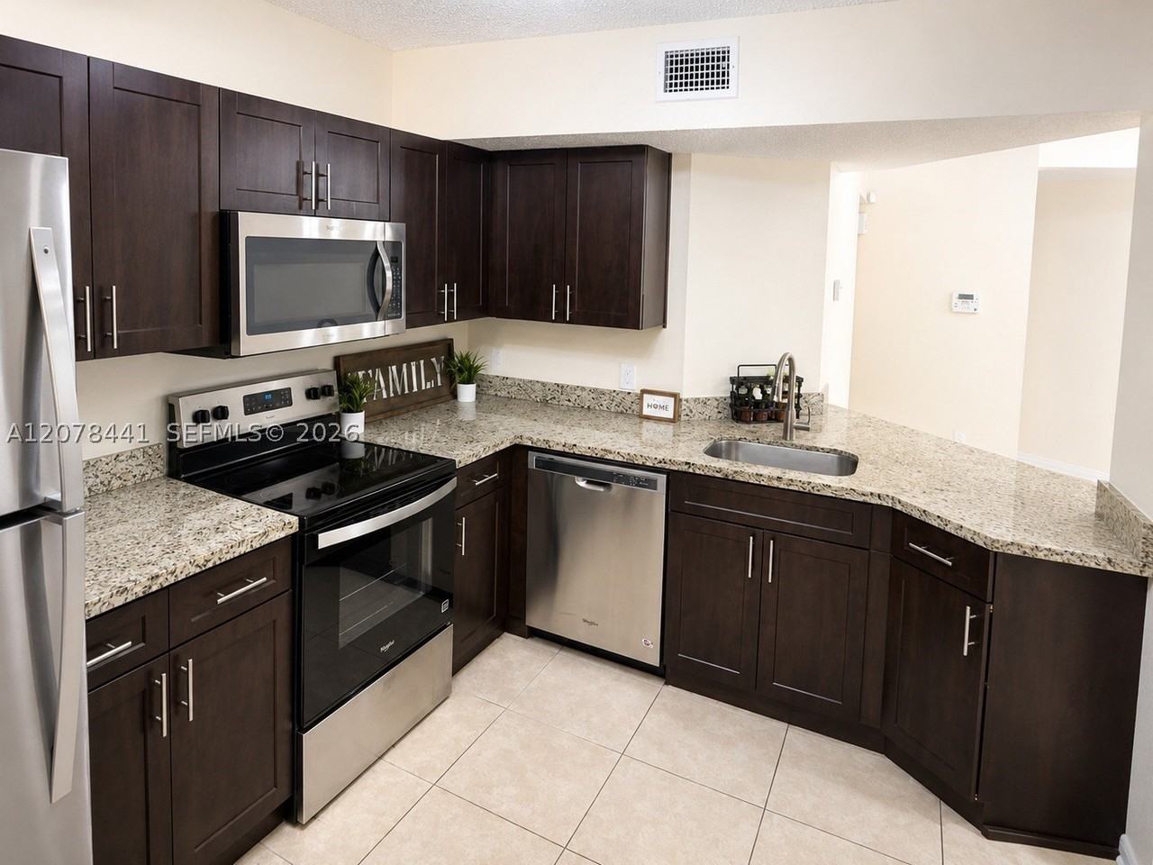 8821 Wiles Rd #304 - Photo 4 of 17