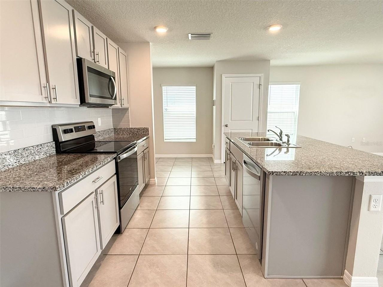 12131 White Cypress Pl - Photo 4 of 35