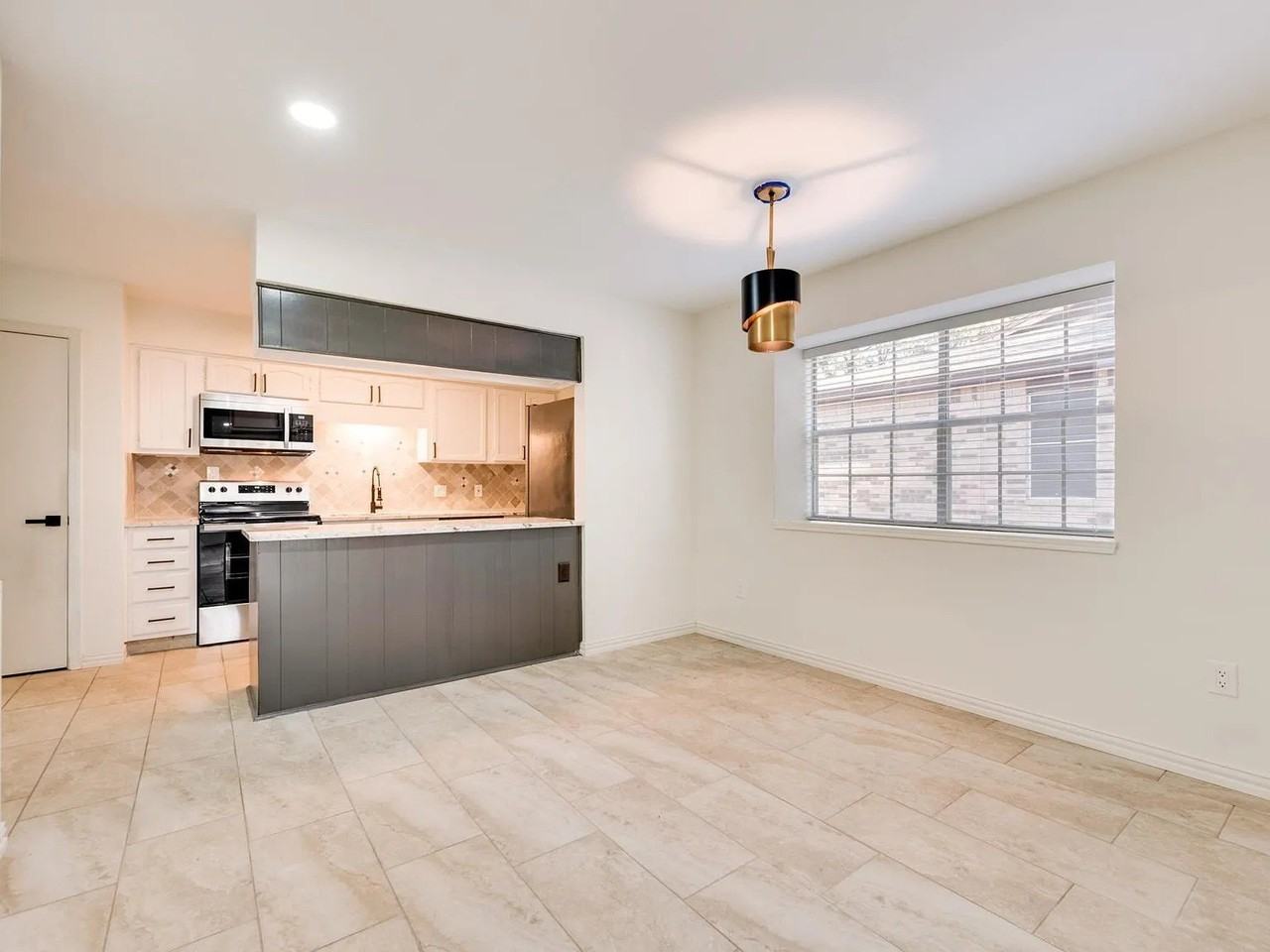 4919 Woodland Park Blvd - Photo 5 of 16