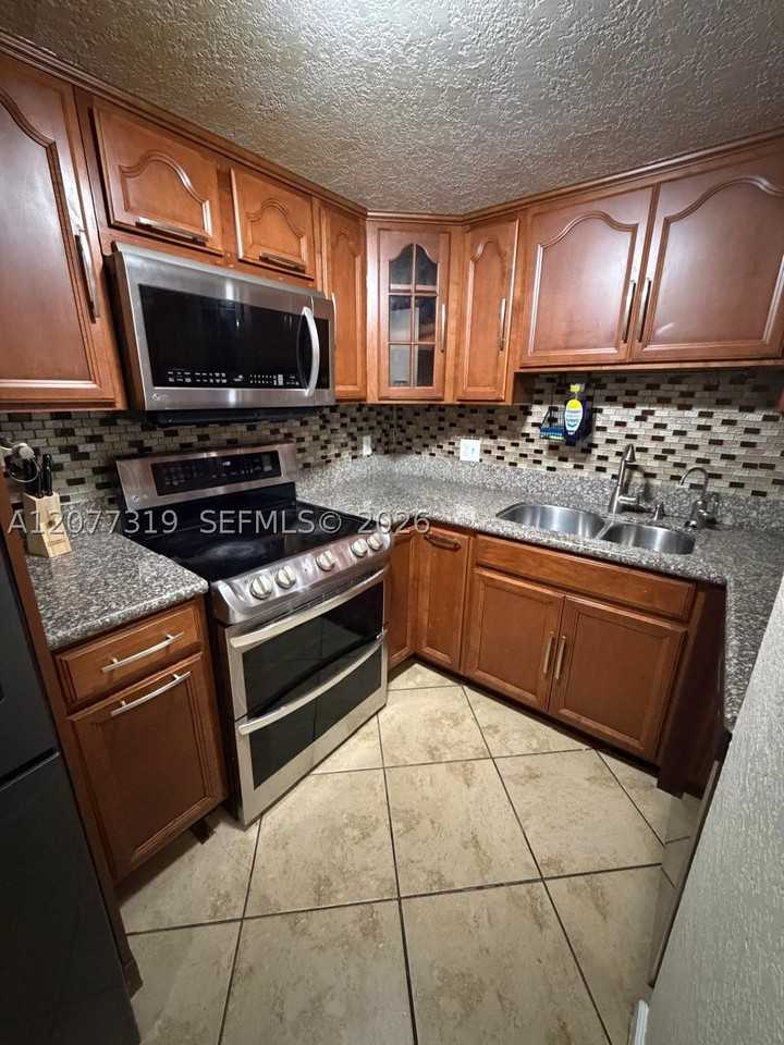 1060 Nw 7th St #205 - Photo 2 of 23
