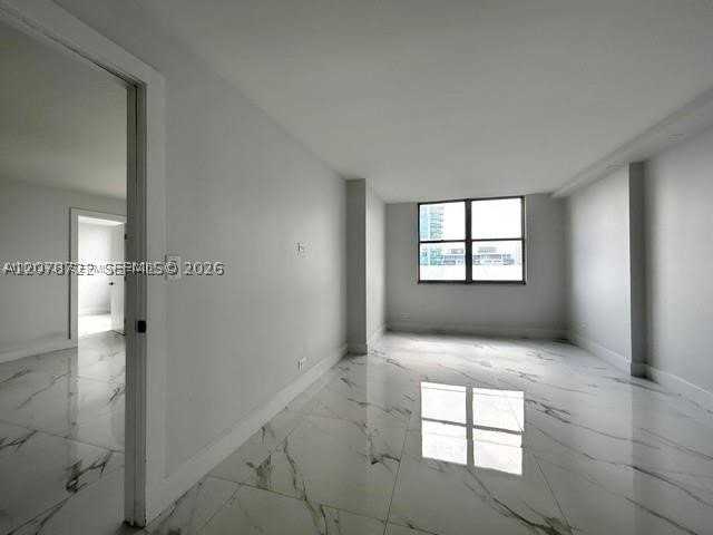 6039 Collins Ave - Photo 6 of 34