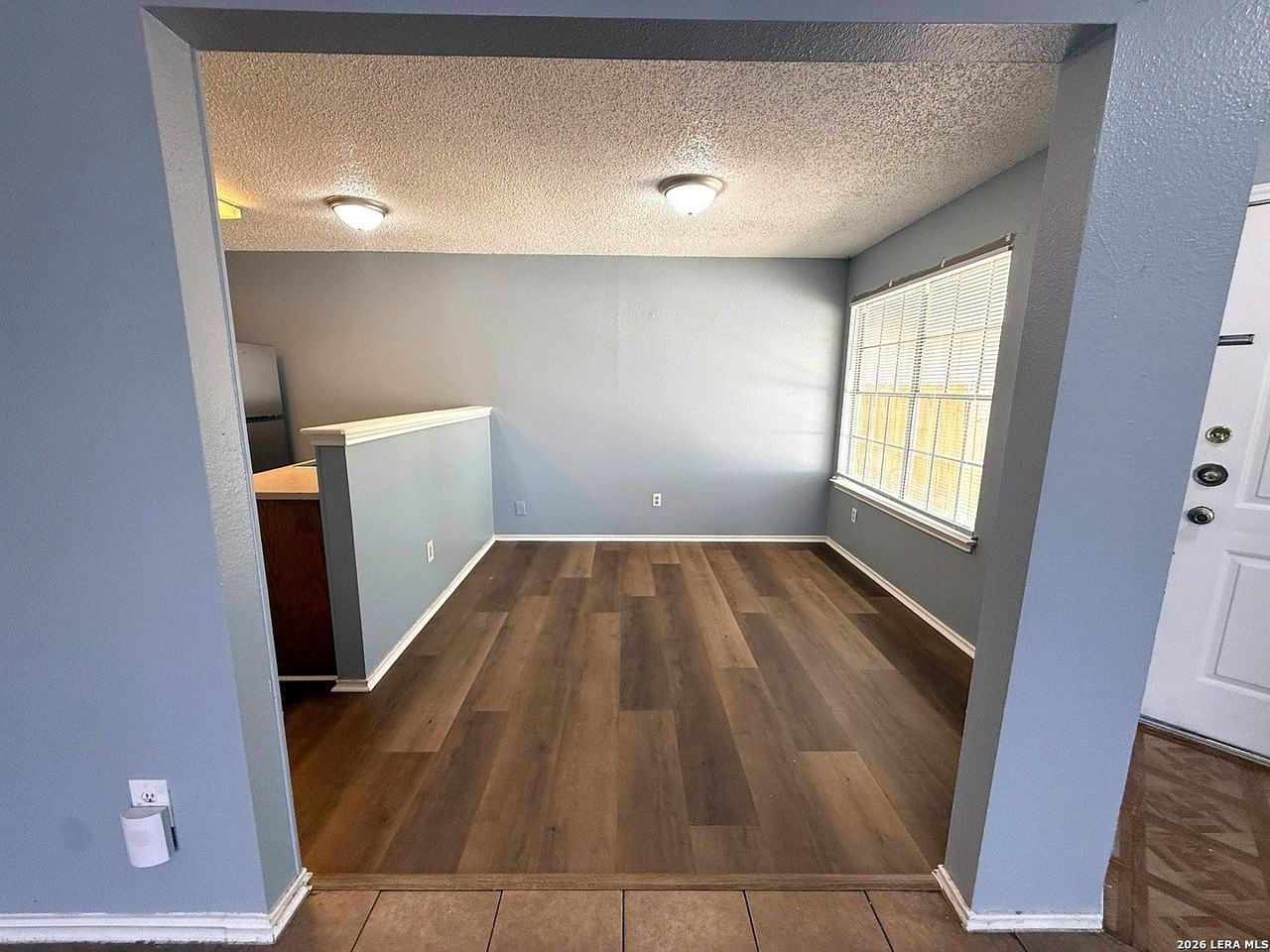 10040 Woodtrail - Photo 6 of 19