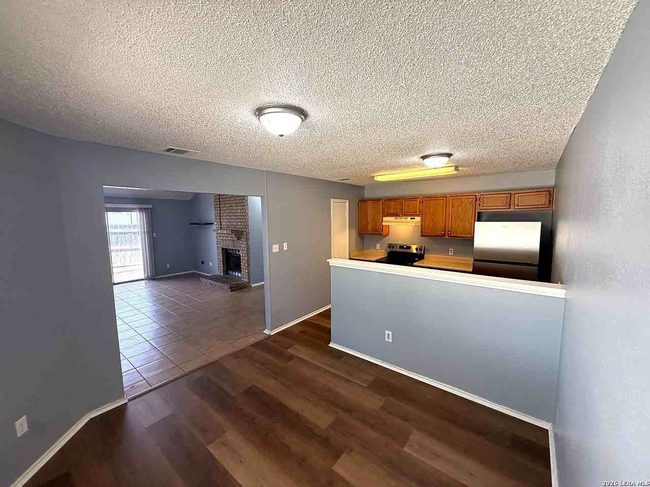 10040 Woodtrail - Photo 7 of 19