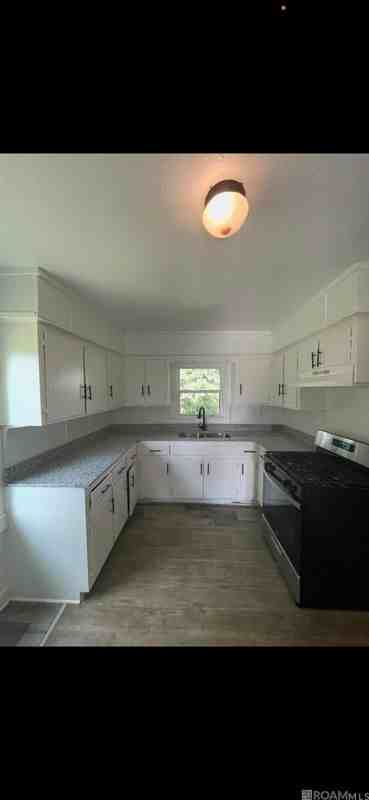1366 Avenue A - Photo 3 of 7