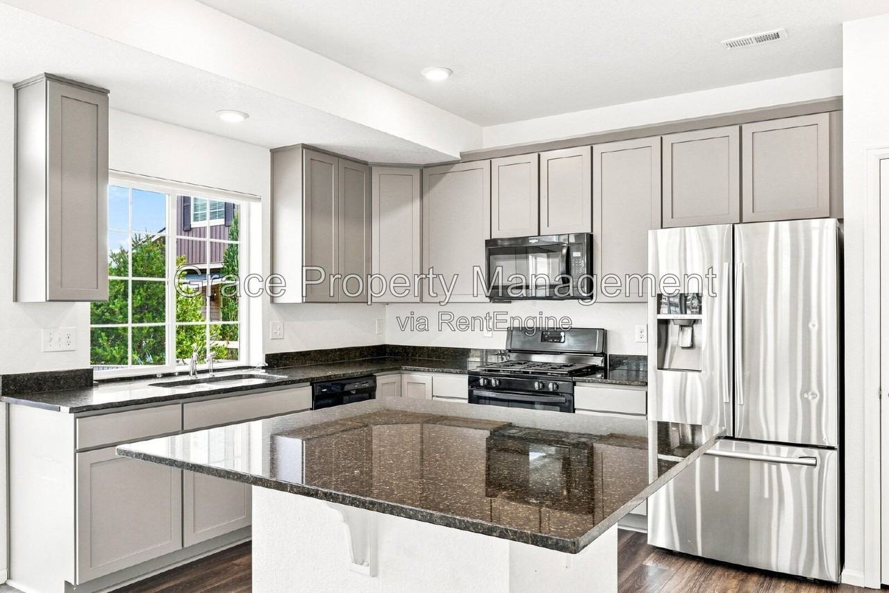 4553 N Quemoy St - Photo 4 of 16