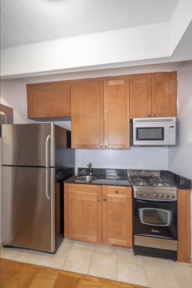 E 34th St - Photo 2 of 15