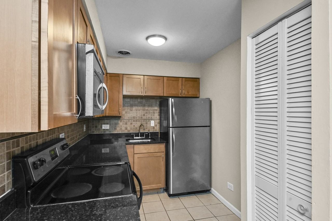 3825 North Pine Grove Avenue, Unit 321 - Photo 2 of 16