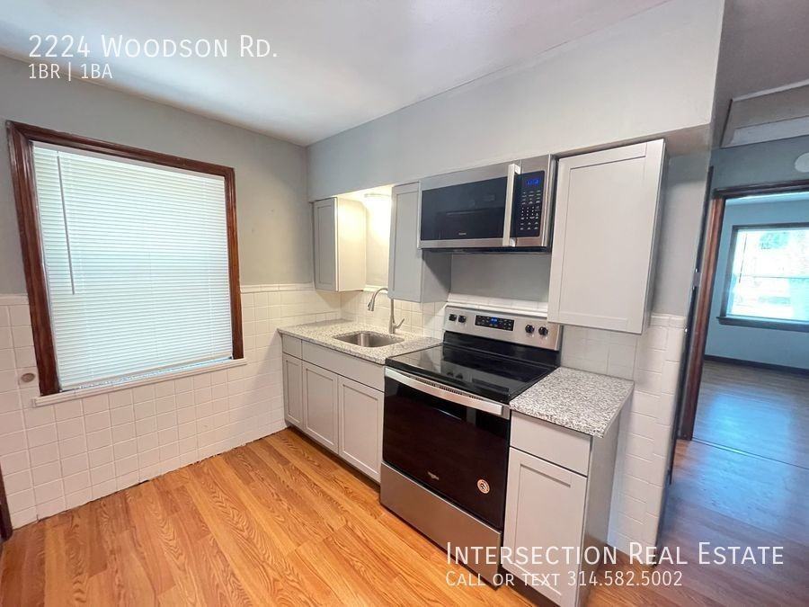 2224 Woodson Rd - Photo 5 of 11