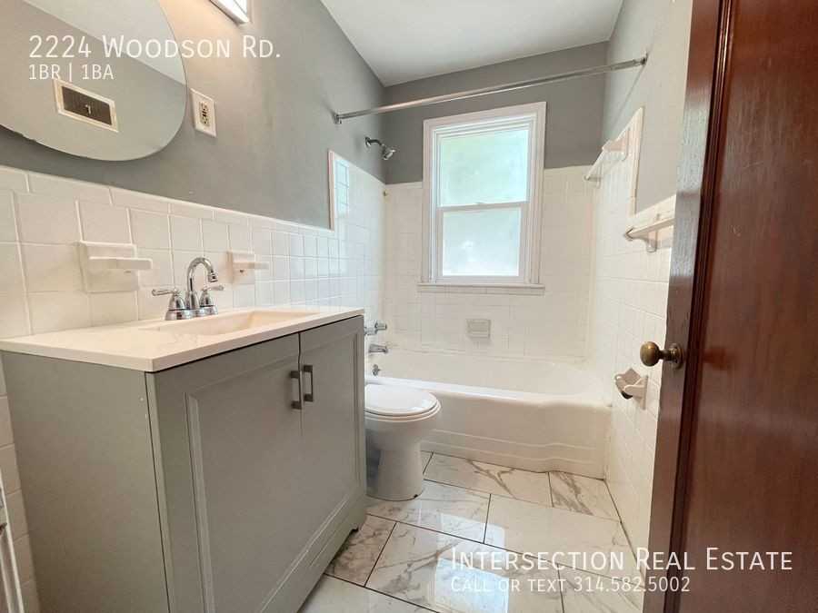 2224 Woodson Rd - Photo 7 of 11