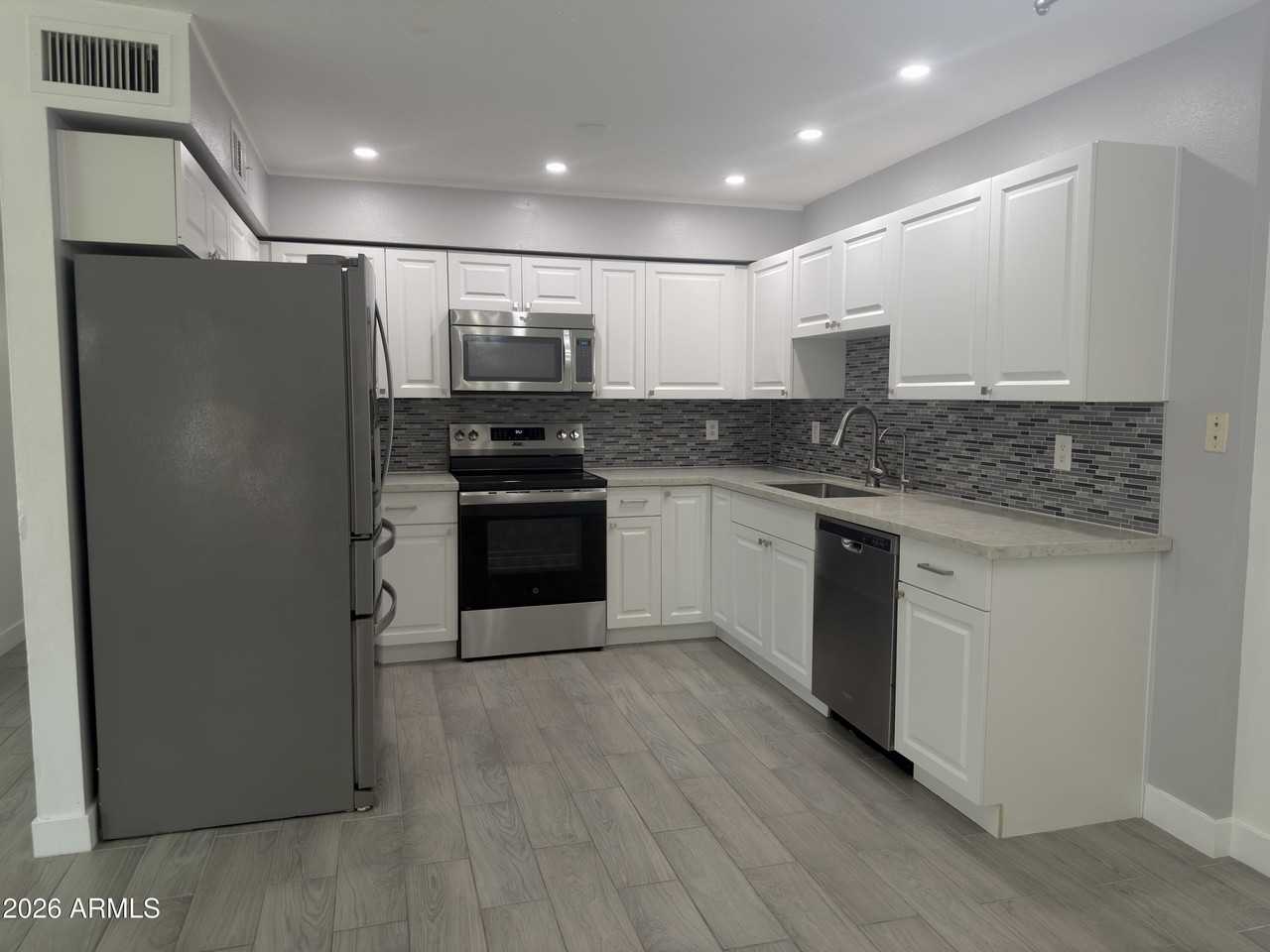 3211 E Calypso Ave - Photo 6 of 23