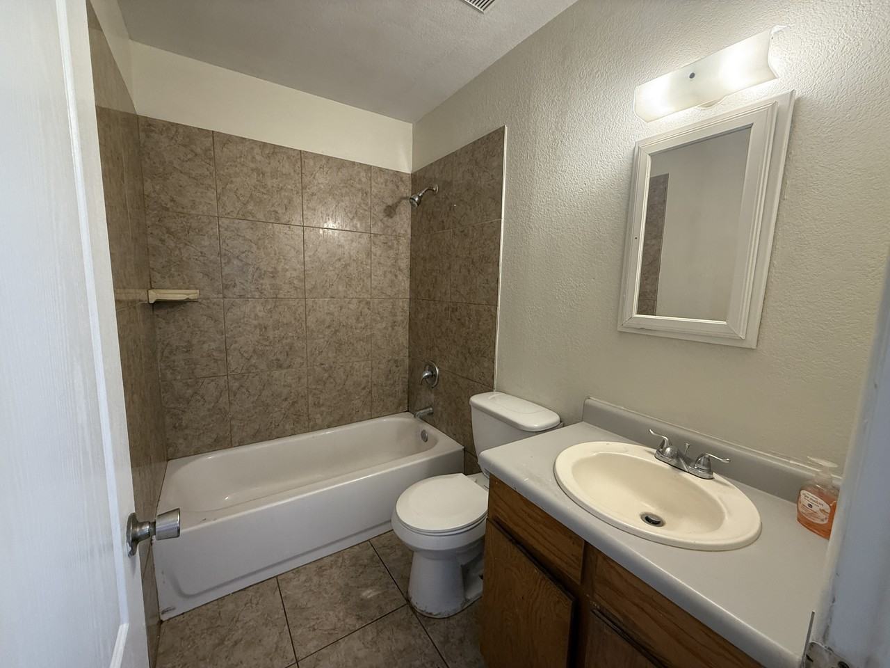 255 E 23rd St #1 - Photo 5 of 9