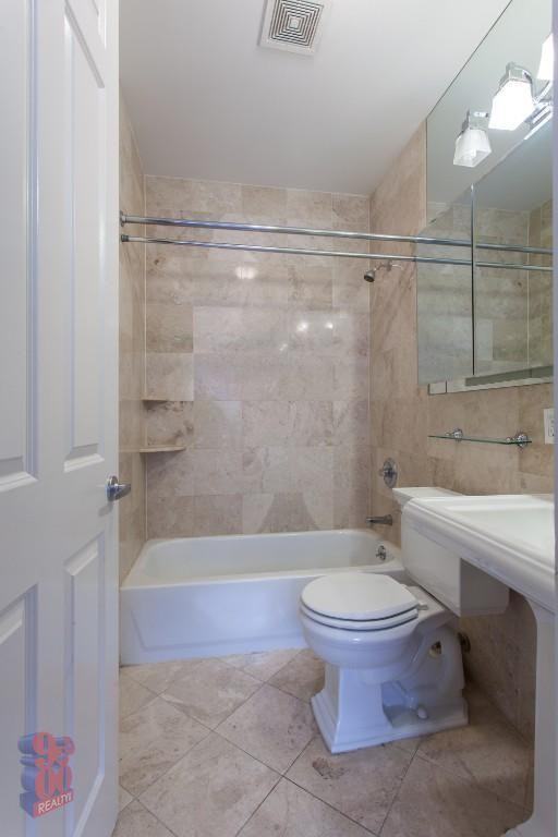 410 E 13th St - Photo 2 of 4