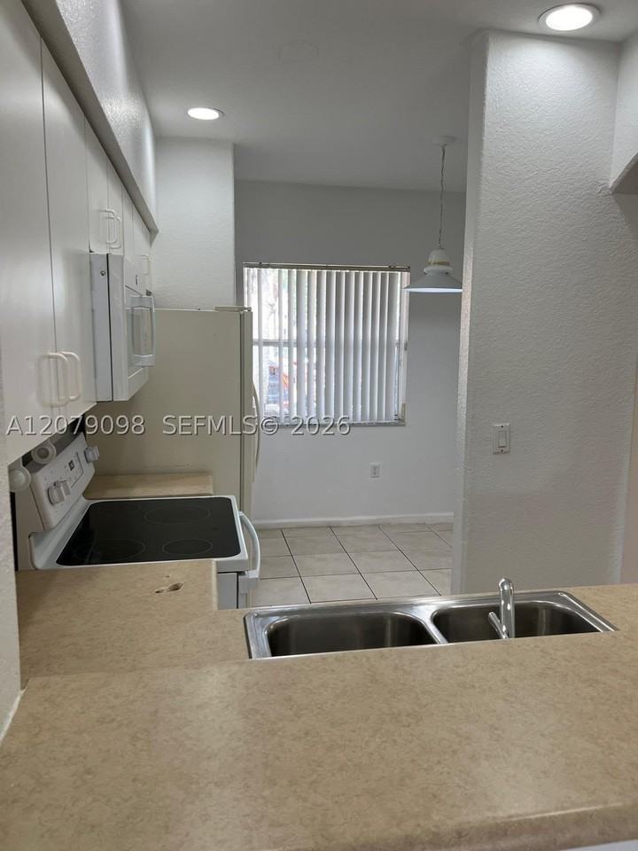 8382 Sw 29th St #104 - Photo 2 of 11