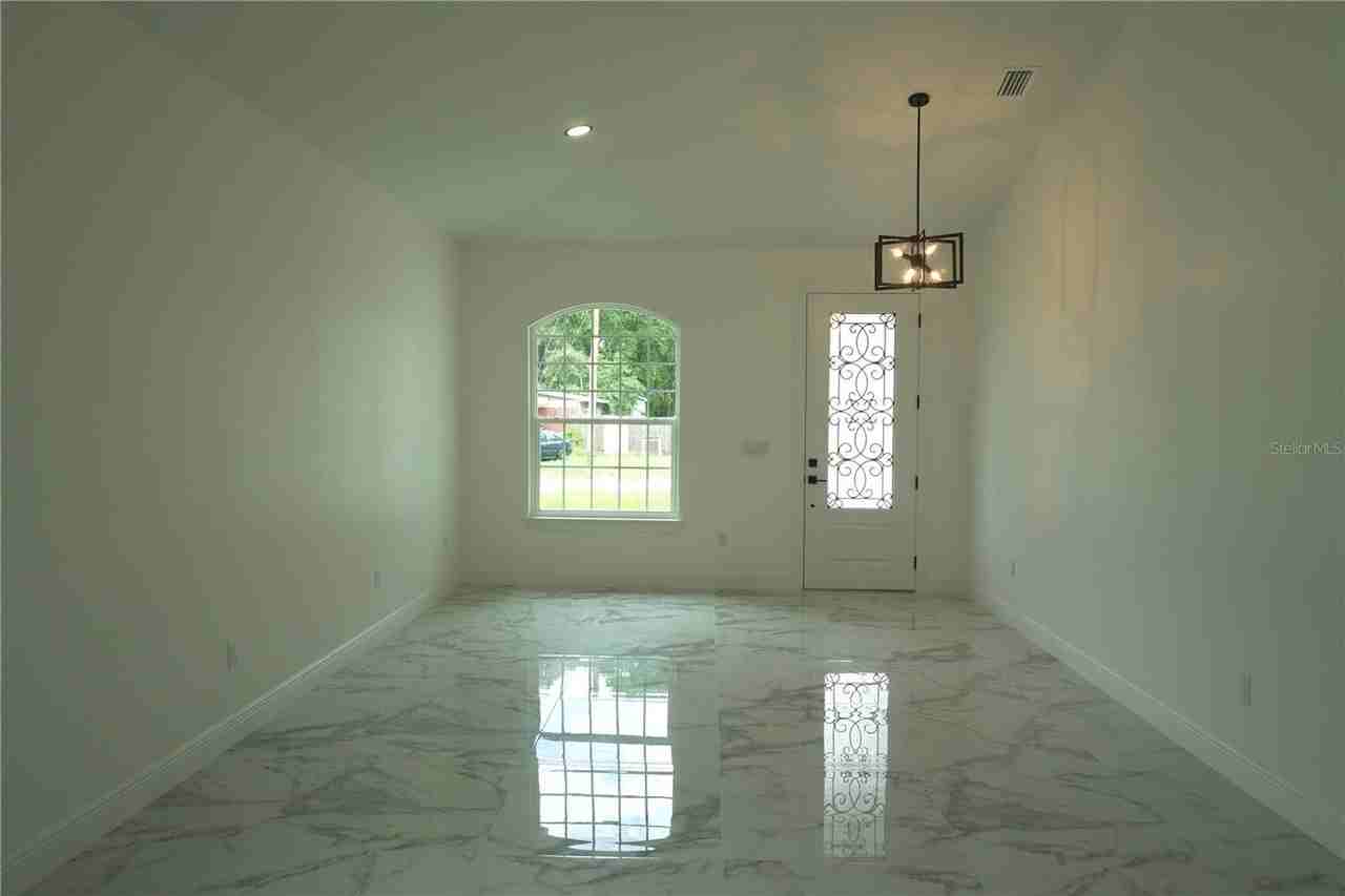 8926 N Orleans Ave - Photo 4 of 46