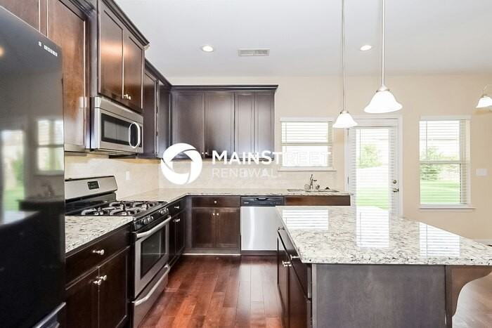 9205 Altridge Dr - Photo 5 of 16