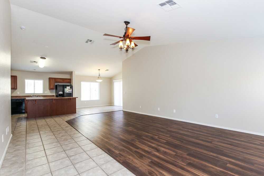 12534 W Surrey Ave - Photo 4 of 15
