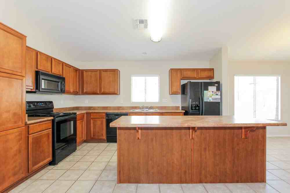 12534 W Surrey Ave - Photo 6 of 15