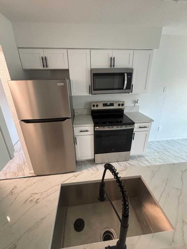 7022 Winter Park Pl - Photo 3 of 15