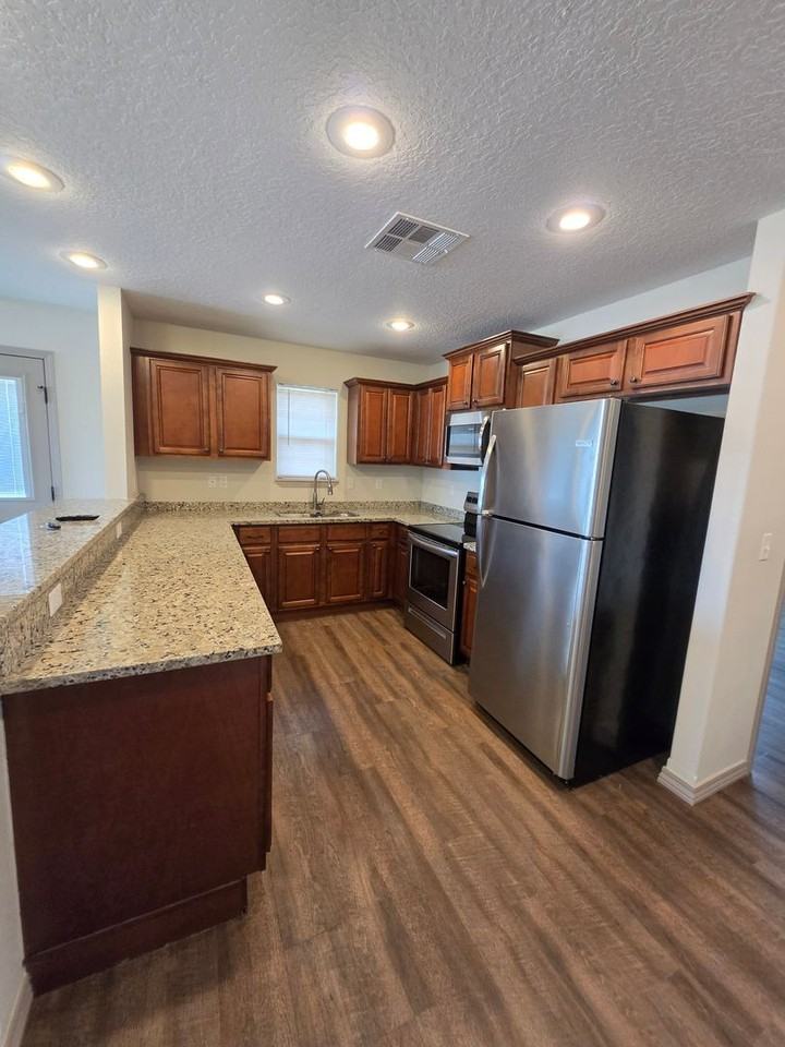 Montana Crossing Duplexes - Photo 5 of 50