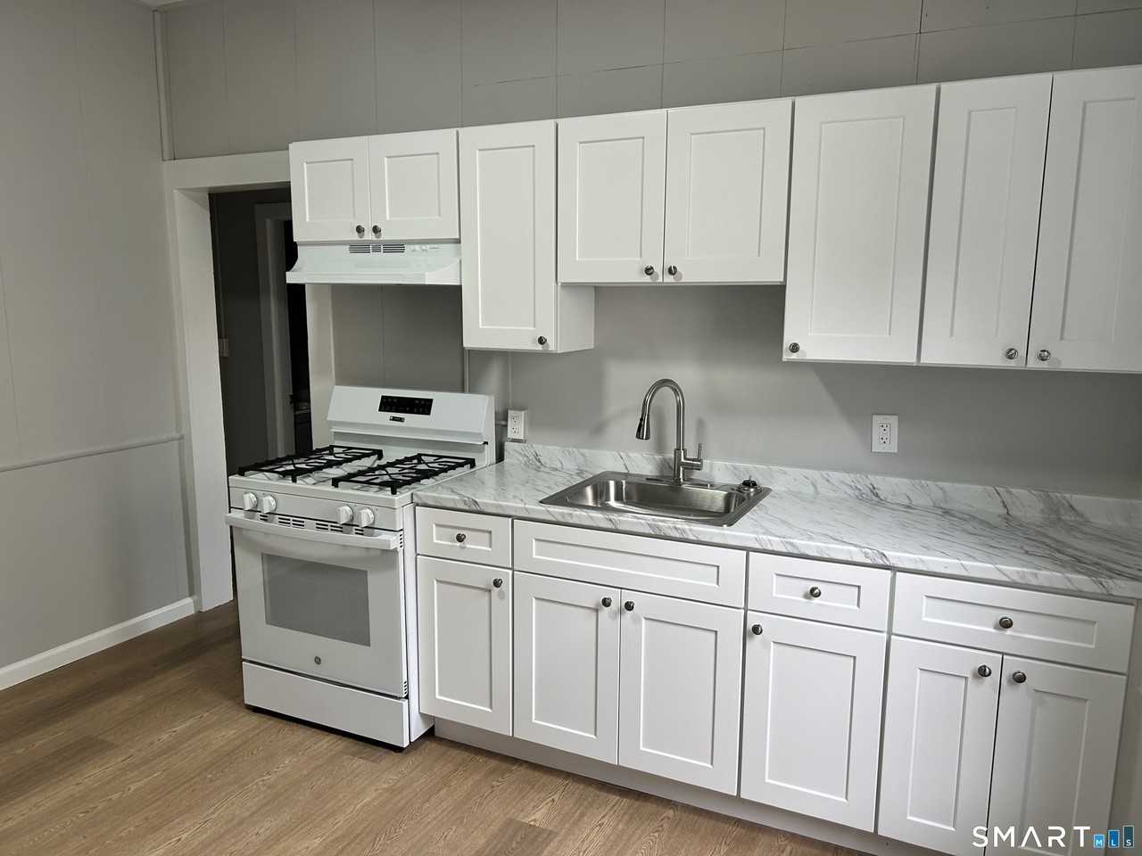 83 Pleasant St - Photo 3 of 10