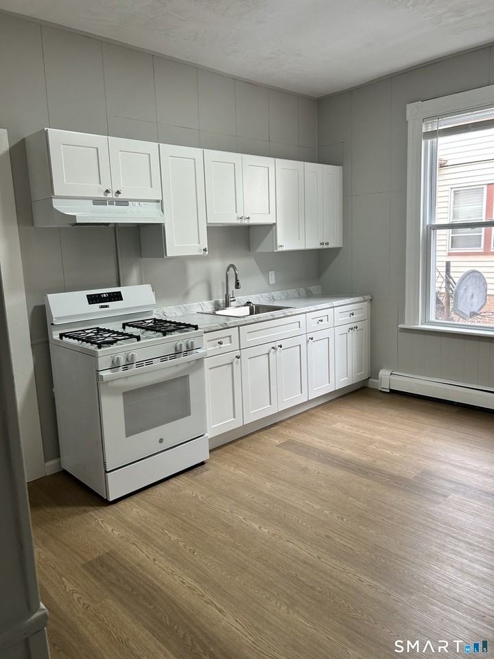 83 Pleasant St - Photo 4 of 10