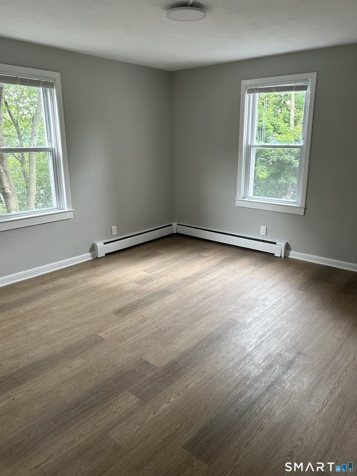 83 Pleasant St - Photo 7 of 10