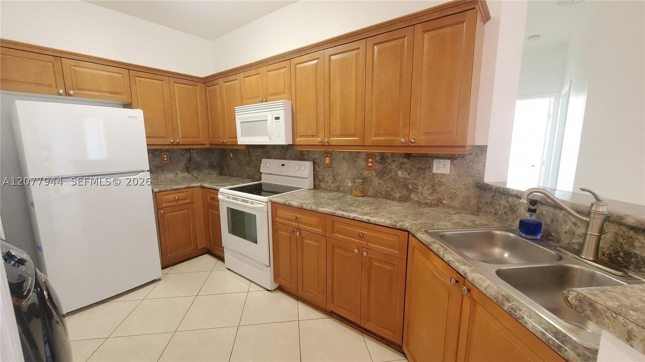 7070 Nw 177th St #205-10 - Photo 3 of 15