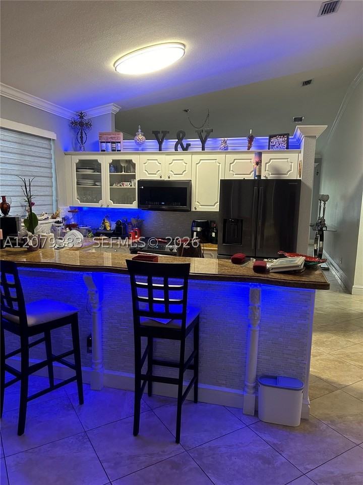 9180 Nw 149th Ter - Photo 5 of 11