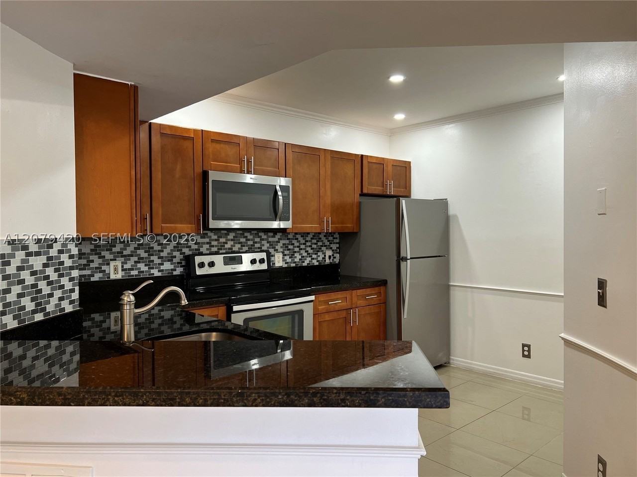 8721 Wiles Rd #306 - Photo 3 of 39