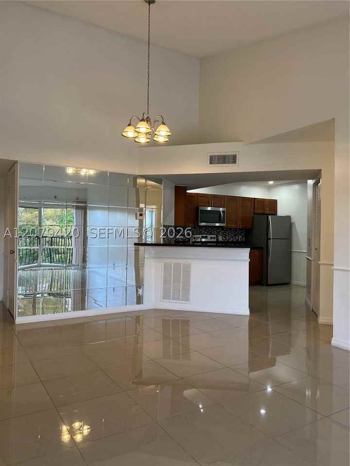 8721 Wiles Rd #306 - Photo 6 of 39