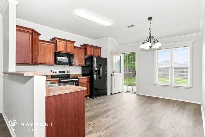 12201 Amaranth Dr - Photo 6 of 12