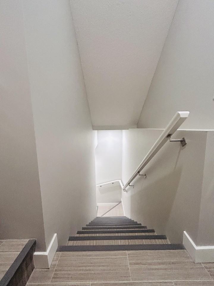 9711 Huxbury Dr NE - Photo 2 of 14