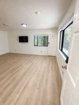 A fully furnished 3 bedroom, 2 bathroom apartment with common areas at 1823 Pelham Ave. Unit 3 - Photo 1 of 1