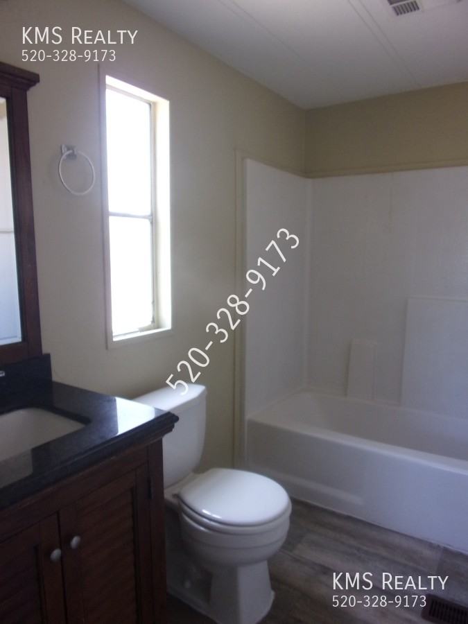 10830 W Warfield Cir - Photo 4 of 41
